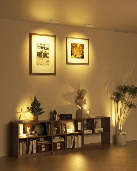 Room with Rechargeable Indoor LED Spotlight Kit With Smart Auto Timer 5500mAh Battery 3 CCT Dimmable Uplights and artwork lighting.