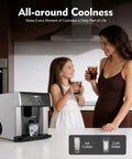 Countertop Ice Maker 2 In 1 Water Dispenser Drop Dead Fast Round Ice Maker With Cold Water On Demand being used by a mother and daughter.