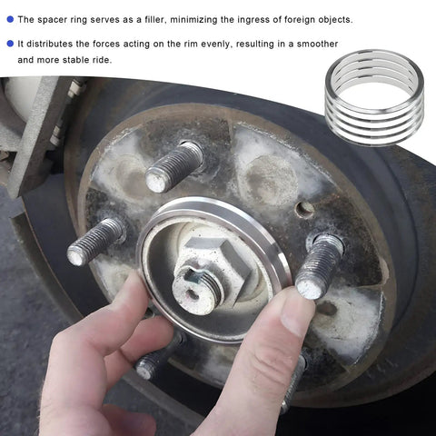 Premium Hub Centric Rings 4 Pcs For Car Wheels 64 To 73 Mm Wheel Adapter Spacers Aluminum Alloy being installed on a car wheel.