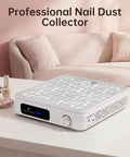 Heavy Duty Cordless Nail Dust Collector With Beast Mode 19500 Rpm Suction For Gel And Acrylic Files Portable Battery Powered Manicure Dust Cleaner Tool on a table with nail polish.