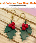 Round shape polymer clay bead roller earrings with red beads and green leaf design for DIY jewelry crafting on wood surface.