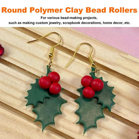 Round shape polymer clay bead roller earrings with red beads and green leaf design for DIY jewelry crafting on wood surface.