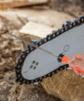 Badass Round File Handles Two Pack With Quick Adjust Nut And Comfy Grips designed for chainsaw touch ups, shown sharpening a chainsaw.