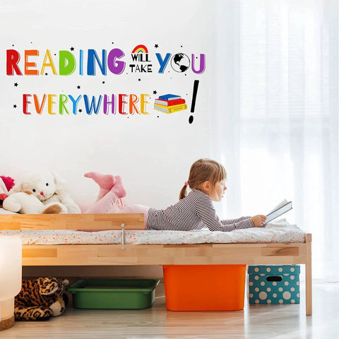 Reading Will Take You Everywhere Inspirational Quote Wall Decal Sticker For Nurseries Classrooms Playrooms And Kids Study Rooms Motivational Phrase Decor That Kids Will Love For Bedrooms Libraries Gifts on wall next to girl reading in bed