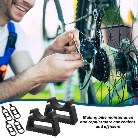 Man tuning bike drivetrain with Rugged Bike Repair Stand With Handlebar Stabilizer For Mountain And Road Bikes tools visible