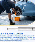 Mechanic using Brake Caliper Pin Punch Removal Tool For Brembo Calipers And Performance Brakes on a car brake system.