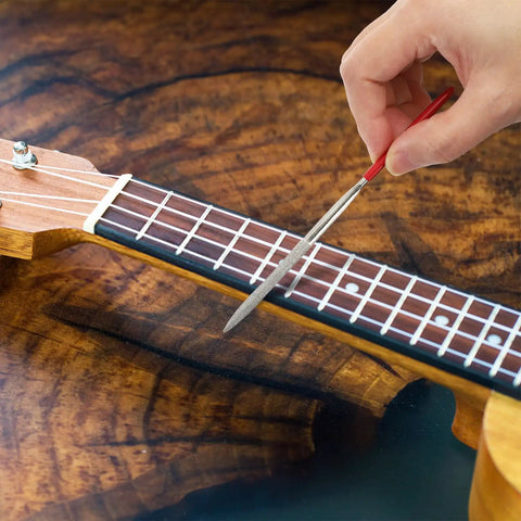 Close-up of fret file from All In One 26 Piece Guitar Setup and Repair Kit with Carry Bag for Guitar Ukulele Bass Mandolin Banjo Tools