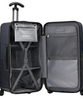 26 inch polycarbonate spinner luggage with tie down straps and TSA lock in navy, showing open interior with compartments and durable design.