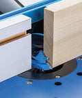 Router Bit Setup Jig For 45 Lock Miter Bits 22627 on woodworking table with precise alignment for miter joints using wood stock.