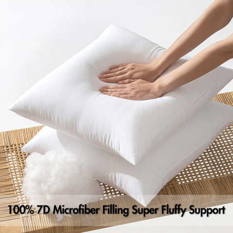 Hands pressing into white pillow on a bamboo mat, showcasing 100% 7D microfiber filling for fluffy support.
