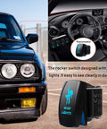 Close-up of 2Pack 5 Pin SPST Rocker Switch Kit With Jumper Wires 12V 20A showcasing blue LED and car dashboard.