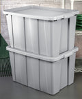 Tough As Nails 30 Gallon Storage Bins With Secure Lids Heavy Duty Plastic Totes stacked in garage for organization.