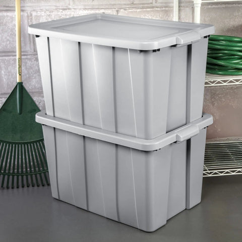 Tough As Nails 30 Gallon Storage Bins With Secure Lids Heavy Duty Plastic Totes stacked in garage for organization.