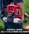 Close-up of 25.4cc 2-stroke engine on Gas String Trimmer 3-In-1 Trimmer Edger And Brush Cutter with red casing