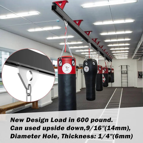 Gym with overhead punching bags and support track system, showing load capacity and design details for heavy-duty fitness use
