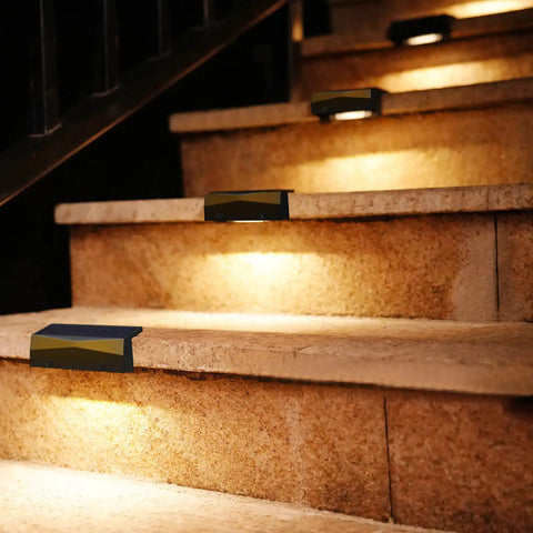 Outdoor Solar Deck Lights Set Of 6 Dope 7 Color RGB Waterproof Step Lights illuminating outdoor stairs with warm glow
