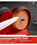 Close-up of Handheld Cordless Bench Grinder With 75Mm Wheel And 150W Motor, showcasing thickened protection around the polishing wheel.