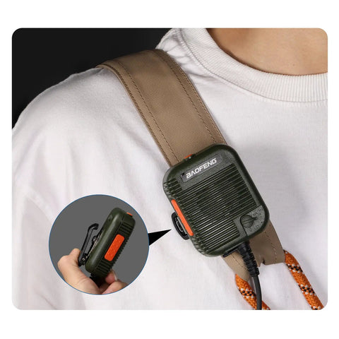 Person wearing Boss Level Rugged Tactical Speaker Mic with Adjustable Volume Clip on Handheld Walkie Talkie Mic on shoulder strap