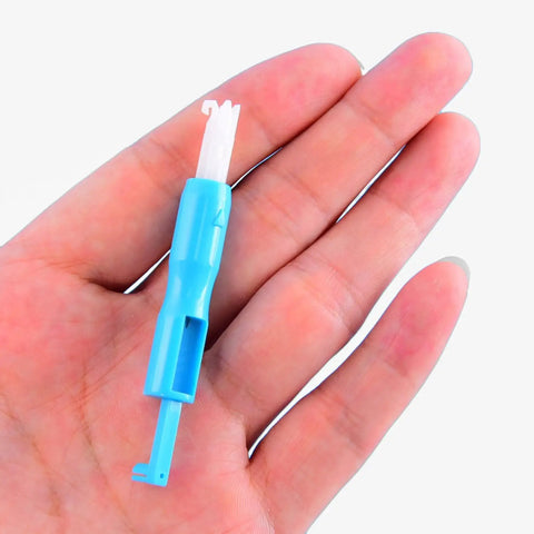 Automatic Needle Threader And Bodkin Set For Sewing Machines, blue PLA tool held in hand for threading assistance