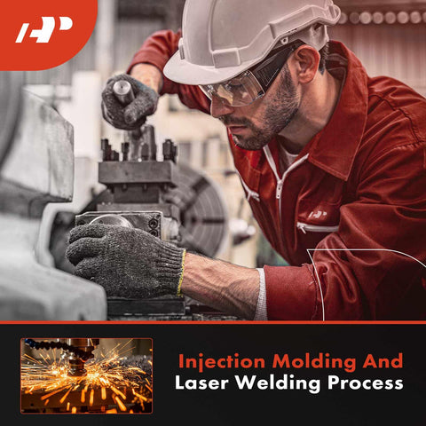 Technician working on injection molding and laser welding machine in a workshop