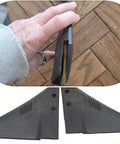 Hand holding Doel Fin Hydrofoil Stabilizer for Outboard Motors and Stern Drives, showing texture and design.