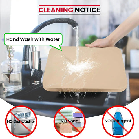 Hand washing a 15 By 12 Inch Pizza Stone For Oven And Grill Cordierite Rectangular Baking Stone under running water in a sink.