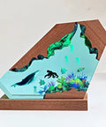 Blue Whale Resin Lamp With Wood Base RGB Ocean Nightstand Light showing a whale in an ocean scene on a wooden base