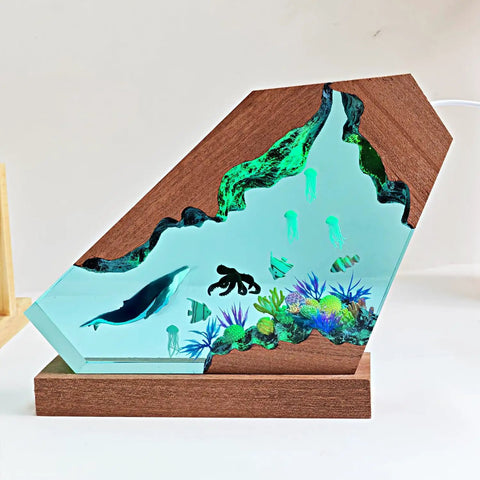 Blue Whale Resin Lamp With Wood Base RGB Ocean Nightstand Light showing a whale in an ocean scene on a wooden base
