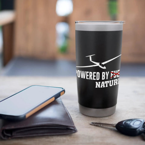 Black stainless steel insulated tumbler with glider design for aviation enthusiasts, next to phone and wallet on table