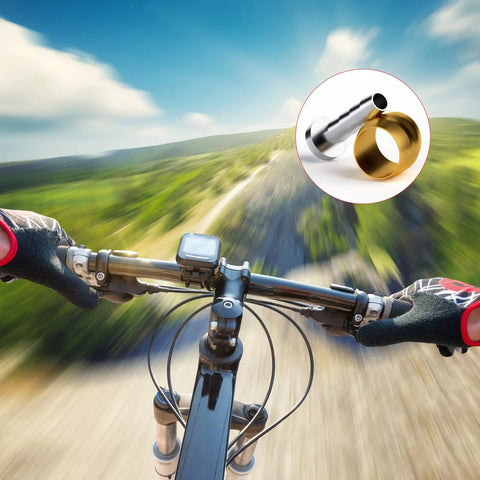 Cyclist view with 20 Piece Bike Brake Olive And Barb Kit for hydraulic disc brake hose overlaid, showing brass olive and steel insert.