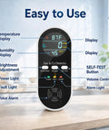 5-In-1 Air Monitor Plug-In With LED Display showing temperature, gas, and humidity readings on a kitchen counter.