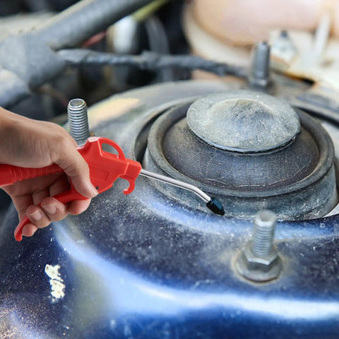 Air Blow Gun With Four Inch Nozzle For Air Compressors And Dust Cleanup Ergonomic Grip Tilting Nozzle in use on car engine