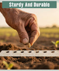 Gardener using Seed Spacers Planting Tool Garden Seed Planter Ruler With 2 Wooden Stakes Ideal For Seedlings Gardeners And Garden Planning Precise Planting Template For Perfect Rows And Even Growth in soil