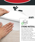 Hands peeling adhesive side of Warning Floor Decal For Machinery Areas Danger Exposed Conveyors And Moving Parts Can Cause Severe Injury
