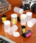 Clear 35mm Plastic Film Canister Set Of 20 With Lids For Storage And Organization Durable PP Jars with film rolls on a table