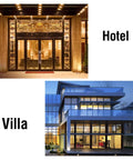 Image showing luxury hotel entrance with ornate lighting and a modern glass-walled villa exterior at night.