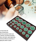Watch Press Die Set 20 Pcs Kit showing green metal and ABS dies from 20 to 58mm, visible in box with watch repair backdrop.