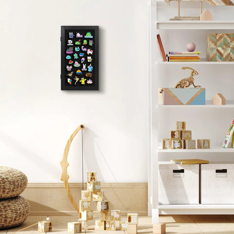 Compact Wall Mounted Pin Display Case Black 15 By 8.5 Inch showcasing colorful enamel badges against a clean wall.