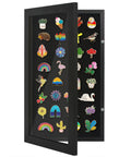 Compact Wall Mounted Pin Display Case Black 15 By 8.5 Inch Collector Showcase Rack Holds Enamel Badges, colorful pins on display.