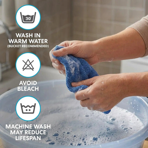 Hands washing Blue Reusable Shop Towels 14 By 12 Inches Pack Of 150 Cotton Cleaning Rags in bucket