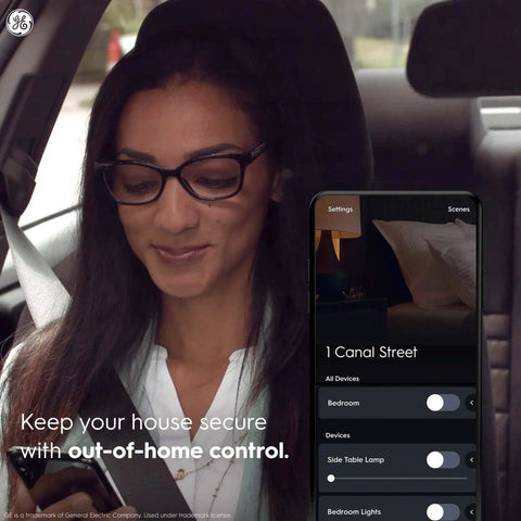 Woman using Cync Paddle Style Smart Light Switch With Neutral Wire Required Bluetooth And 2.4 GHz Wi Fi Connectivity Works With Alexa And Google Home app