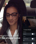 Woman in car controlling Cync WiFi 2 Amp Multi Location White Touchless Illuminated Smart Light Switch via smartphone app