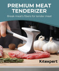 Hand using Meat Tenderizer Hammer With Comfortable Grip Handle Dual Sided Mallet on steak with garlic in kitchen
