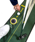 Person using Golf Putting Training Mat 10 Foot Long With Visual Alignment Aids Stroke Amplitude Guide Eye Position Tips
