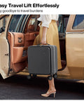 Person lifting Underseat Carry On Luggage 17x14x9 With PC Hard Shell And Aluminum Frame Top Opening Travel Case On Wheels Scratch Resistant Covestro PC Rock Gray No Fuss City Ready Luggage For Quick Trips