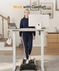 Person using Electric Standing Desk With Three Memory Presets, 40 By 24 Inch Sit To Stand Desk, Quiet Motor, Ergonomic White Top