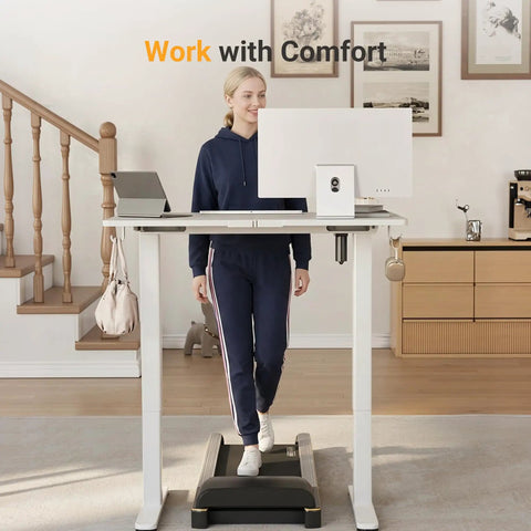 Person using Electric Standing Desk With Three Memory Presets, 40 By 24 Inch Sit To Stand Desk, Quiet Motor, Ergonomic White Top