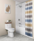 Bathroom scene featuring a tub with colorful shower curtain, modern toilet, and decorative accents.