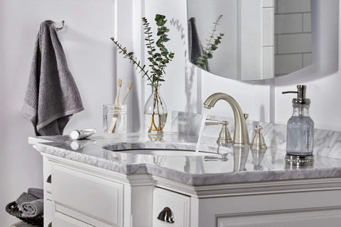 Elmhurst Two-Handle Widespread Bath Faucet in brushed nickel on marble countertop, 3-hole install, ADA compliant fixture