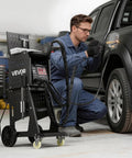 Technician using Beefed Up Stud Welder Dent Puller Kit With Welding Cart, 3KW Spot Welder, Twin Guns, 7 Modes, 110V for car repair
